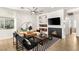 Comfortable living room featuring a fireplace and built-in shelving for storage and style at 8317 Fritzen Ave, Las Vegas, NV 89131