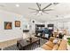 Open concept living room showcasing modern décor and seamless flow into the kitchen area at 8317 Fritzen Ave, Las Vegas, NV 89131