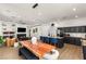Open layout featuring a seamless flow between kitchen, dining, and living areas at 8317 Fritzen Ave, Las Vegas, NV 89131