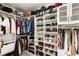 Organized walk-in closet with ample shelving and hanging space for clothing and accessories at 8317 Fritzen Ave, Las Vegas, NV 89131