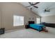 Spacious main bedroom boasts high ceilings, neutral tones, and lots of natural light at 9469 Coral Shine Ct, Las Vegas, NV 89123