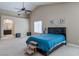 This main bedroom features neutral paint, bedside tables, and an ensuite bathroom at 9469 Coral Shine Ct, Las Vegas, NV 89123