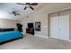 Large main bedroom has vaulted ceiling, ceiling fans, and a mirrored dresser at 9469 Coral Shine Ct, Las Vegas, NV 89123