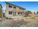 Back exterior view featuring a patio and desert landscaping in the backyard at 10135 Diving Duck Ave, Las Vegas, NV 89117