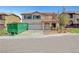 Charming two-story home with a tile roof and a two-car garage, awaiting landscaping and cleanup at 10135 Diving Duck Ave, Las Vegas, NV 89117