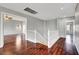 Hallway features hardwood floors and white trim at 10135 Diving Duck Ave, Las Vegas, NV 89117