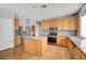 Modern kitchen with stainless steel appliances, granite countertops, and a central island at 10135 Diving Duck Ave, Las Vegas, NV 89117