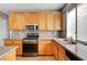 Well-equipped kitchen featuring stainless steel appliances and an eat-in island at 10135 Diving Duck Ave, Las Vegas, NV 89117
