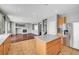 Modern kitchen with an island, stainless steel appliances, and convenient access to living spaces at 10135 Diving Duck Ave, Las Vegas, NV 89117