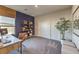 Comfortable home office space with ample natural light and functional desk and storage solutions at 1048 Forrest Falcon Dr, Henderson, NV 89011