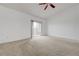 Spacious bedroom with a sliding glass door leading to a private balcony for outdoor enjoyment at 10525 Pine Glen Ave # 206, Las Vegas, NV 89144