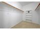 Walk-in closet with built-in shelving for optimal storage and easy organization at 10525 Pine Glen Ave # 206, Las Vegas, NV 89144