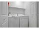 Bright laundry room with washer and dryer at 10525 Pine Glen Ave # 206, Las Vegas, NV 89144