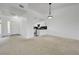 Open floor plan with views from living room to kitchen at 10525 Pine Glen Ave # 206, Las Vegas, NV 89144