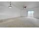Spacious living room with sliding glass doors at 10525 Pine Glen Ave # 206, Las Vegas, NV 89144