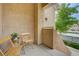 Relaxing patio with two chairs and desert view at 10525 Pine Glen Ave # 206, Las Vegas, NV 89144