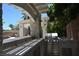 Outdoor kitchen featuring a built-in grill and shaded pergola at 10591 Haywood Dr, Las Vegas, NV 89135
