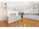 Spacious white kitchen with a large island, stainless appliances, and ample cabinet space at 10712 Back Plains Dr, Las Vegas, NV 89134