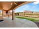 Covered patio overlooking the golf course with mountain views in the background at 10712 Back Plains Dr, Las Vegas, NV 89134