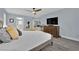 Spacious bedroom with ample natural light and seamless access to the en suite bathroom at 10902 Fintry Hills St, Las Vegas, NV 89141