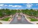 Stunning aerial view of Royal Highlands' gated community entrance, showcasing lush landscaping and a welcoming entry point at 10902 Fintry Hills St, Las Vegas, NV 89141