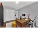 Comfortable home office with desk, modern chair, laptop and a sliding door closet at 10902 Fintry Hills St, Las Vegas, NV 89141