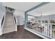 Bright living room area overlooking an outdoor pool, light colored walls, and an open floor plan at 10902 Fintry Hills St, Las Vegas, NV 89141