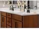 Elegant bathroom with double sink vanity, modern fixtures, and white countertop at 12430 Foxtail Run Ave, Las Vegas, NV 89138