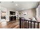 Upstairs living room with fireplace, tv and lots of space at 12430 Foxtail Run Ave, Las Vegas, NV 89138