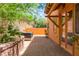 Private backyard with a covered spa and a beautifully landscaped area for outdoor enjoyment at 1252 Casa Palermo Cir, Henderson, NV 89011