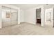 Spacious bedroom featuring a large mirrored closet and ensuite bathroom entrance at 1252 Casa Palermo Cir, Henderson, NV 89011
