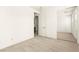 Bright bedroom featuring neutral carpet and a mirrored closet at 1252 Casa Palermo Cir, Henderson, NV 89011