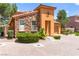 Beautiful home with stone facade, a tile roof, and professional landscaping at 1252 Casa Palermo Cir, Henderson, NV 89011
