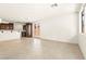 Bright and airy living space showcasing the modern kitchen with stainless appliances and tile flooring at 1252 Casa Palermo Cir, Henderson, NV 89011