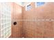 Contemporary shower stall featuring unique tile design and glass block for natural light at 1252 Casa Palermo Cir, Henderson, NV 89011