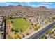 Aerial view showcasing the neighborhood park and recreational area near single-Gathering homes at 133 Clouded Ave, Henderson, NV 89002