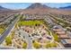 A Primary-planned community with parks, playgrounds, and walking paths surrounded by desert landscaping and mountain views at 133 Clouded Ave, Henderson, NV 89002