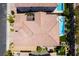 Aerial view of tile roof and backyard showing pool, outdoor seating, and landscaping at 133 Clouded Ave, Henderson, NV 89002