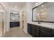 Dual vanity sinks and large shower in a modern bathroom at 133 Clouded Ave, Henderson, NV 89002