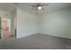 Spacious bedroom with a ceiling fan and access to an ensuite bathroom and walk-in closet at 133 Clouded Ave, Henderson, NV 89002