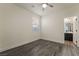 Bedroom featuring wood-look flooring, a single window, and an ensuite bathroom at 133 Clouded Ave, Henderson, NV 89002
