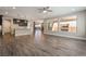 Spacious living room featuring hardwood floors, pendant lights, and lots of natural light at 133 Clouded Ave, Henderson, NV 89002