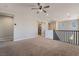 Loft space featuring carpet, a ceiling fan, and access to laundry closet at 133 Clouded Ave, Henderson, NV 89002