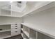 Walk-in pantry featuring custom shelving, drawers, and ample storage space for all your needs at 133 Clouded Ave, Henderson, NV 89002