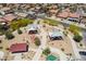 Community playground shaded by sunshades and surrounded by desert landscaping and walkways for neighborhood children at 133 Clouded Ave, Henderson, NV 89002