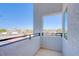 Balcony view with black metal railing, offering a peek at the city skyline at 145 Aqua Commons Ln, Henderson, NV 89015