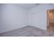 Carpeted bedroom with sliding door closet at 145 Aqua Commons Ln, Henderson, NV 89015