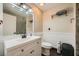 Bathroom offering modern vanity with sink, toilet, and access to the tiled walk-in shower at 1491 Sunrise View Dr, Las Vegas, NV 89110