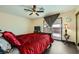 Bedroom featuring wood-style floors, ceiling fan, and sliding glass doors to the backyard patio at 1491 Sunrise View Dr, Las Vegas, NV 89110