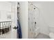 Upstairs bathroom featuring tub with shower and an open doorway at 2004 Peaceful Mesa Ct, Henderson, NV 89052